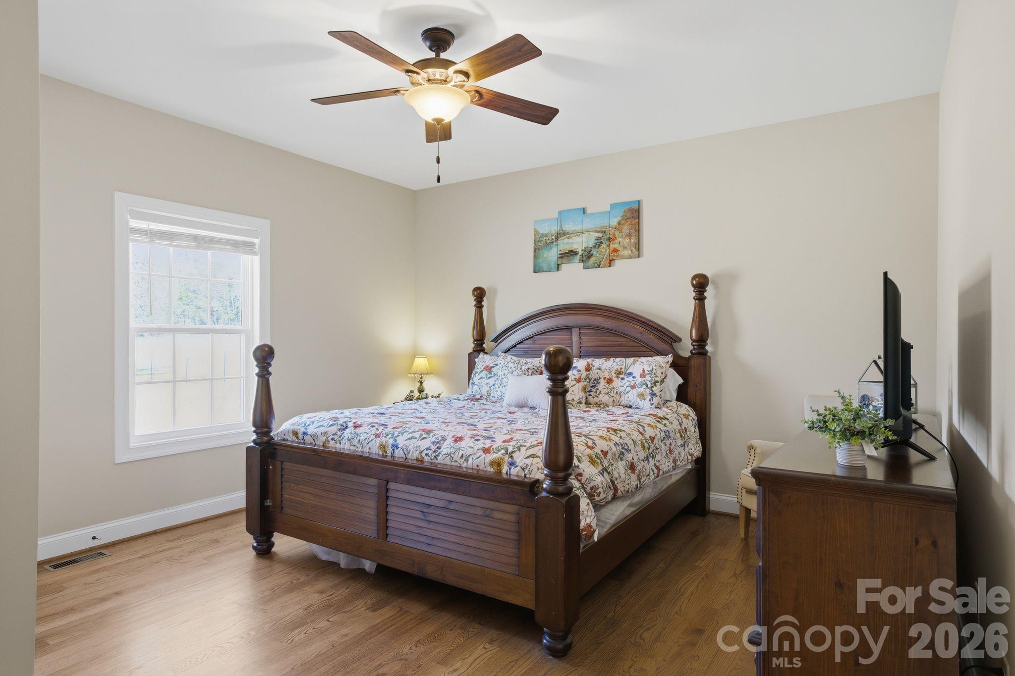 1370 Null Road, Unit 4 Lincolnton, NC 28092 - Photo 26 of 47 a bedroom with a bed and a window
