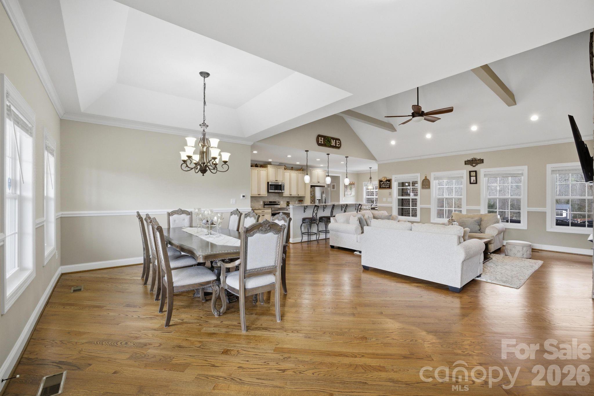 1370 Null Road, Unit 4 Lincolnton, NC 28092 - Photo 3 of 47 a living room with furniture and a chandelier