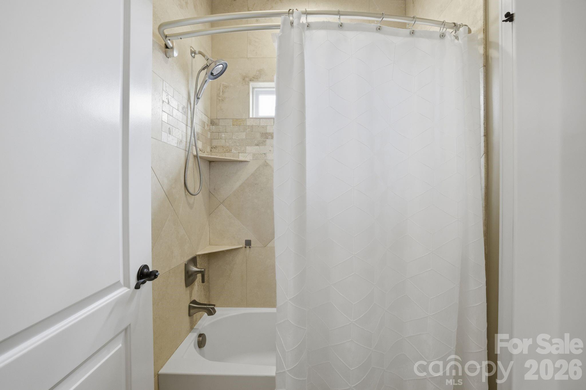 1370 Null Road, Unit 4 Lincolnton, NC 28092 - Photo 31 of 47 a bathroom with a glass shower door