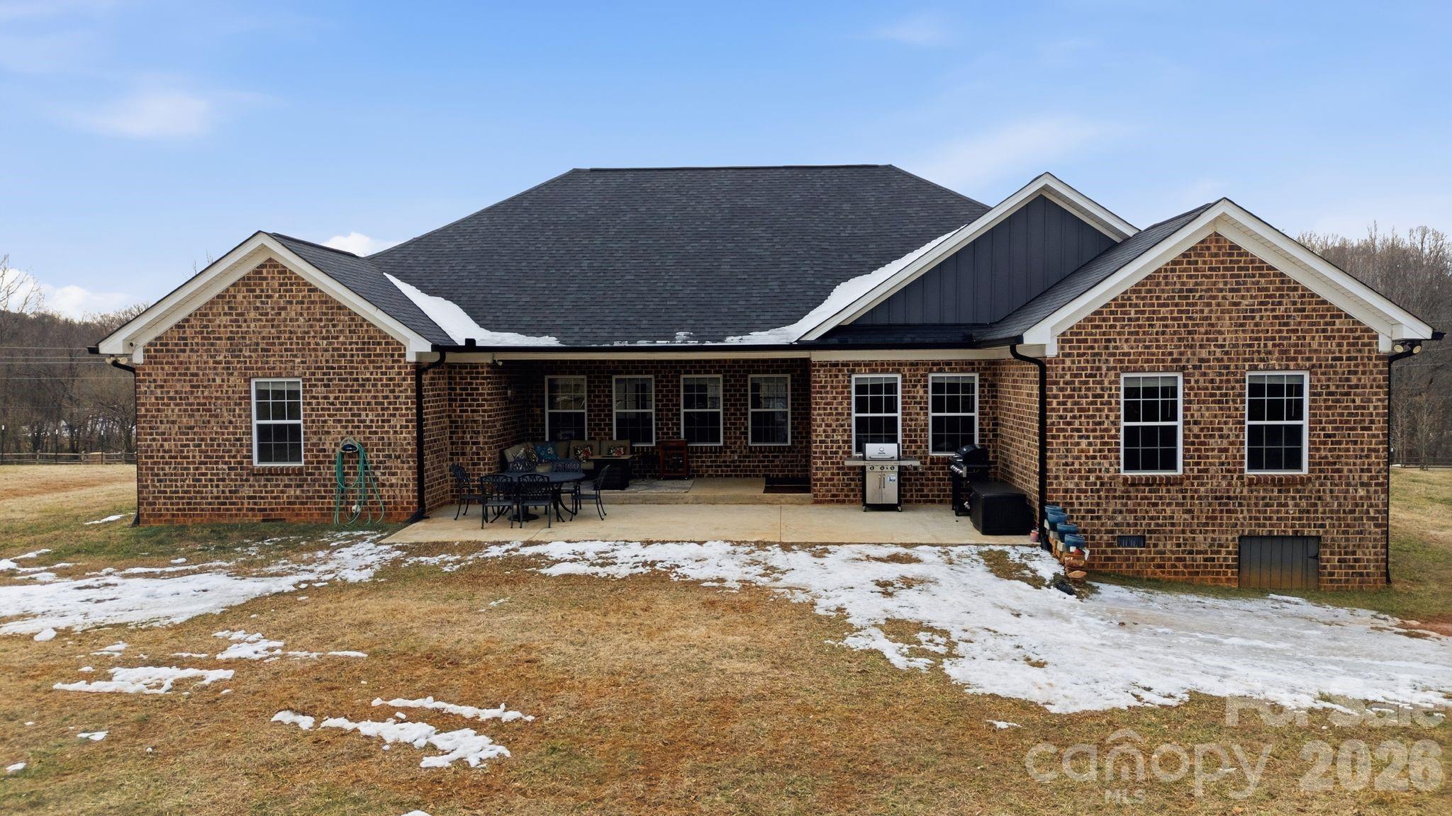 1370 Null Road, Unit 4 Lincolnton, NC 28092 - Photo 40 of 47 a front view of a house with a outdoor space