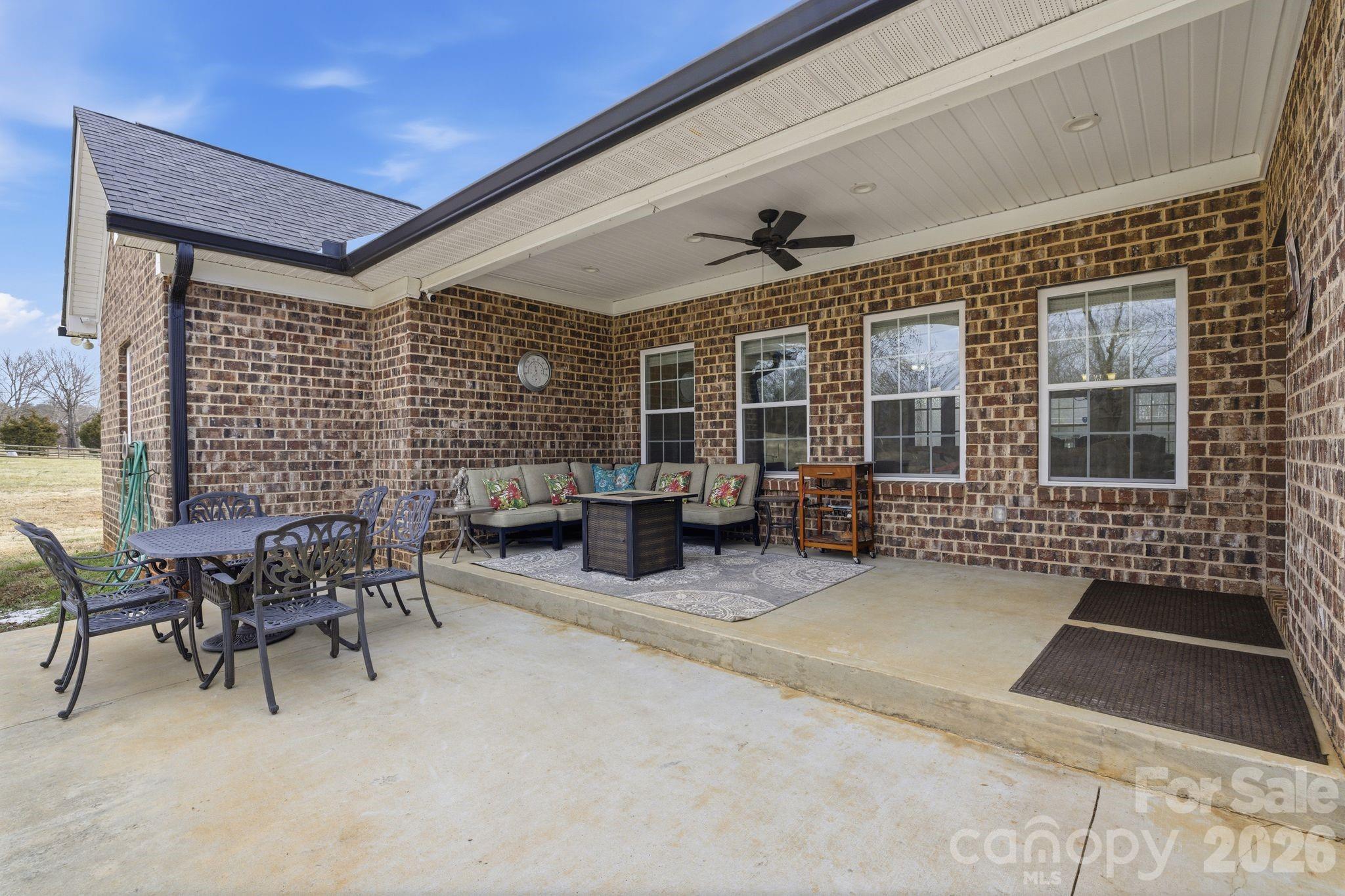 1370 Null Road, Unit 4 Lincolnton, NC 28092 - Photo 42 of 47 a backyard of a house with outdoor seating