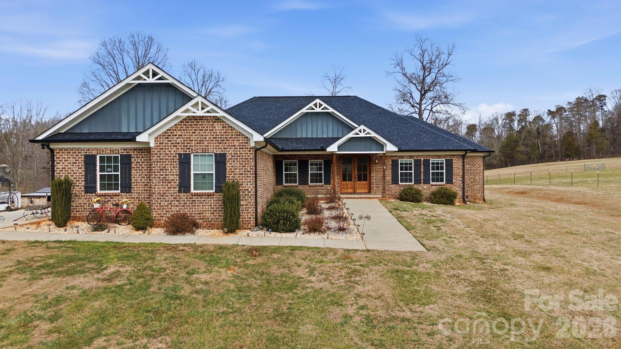 1370 Null Road, Unit 4 Lincolnton, NC 28092 - Photo 47 of 47 front view of a house with a yard