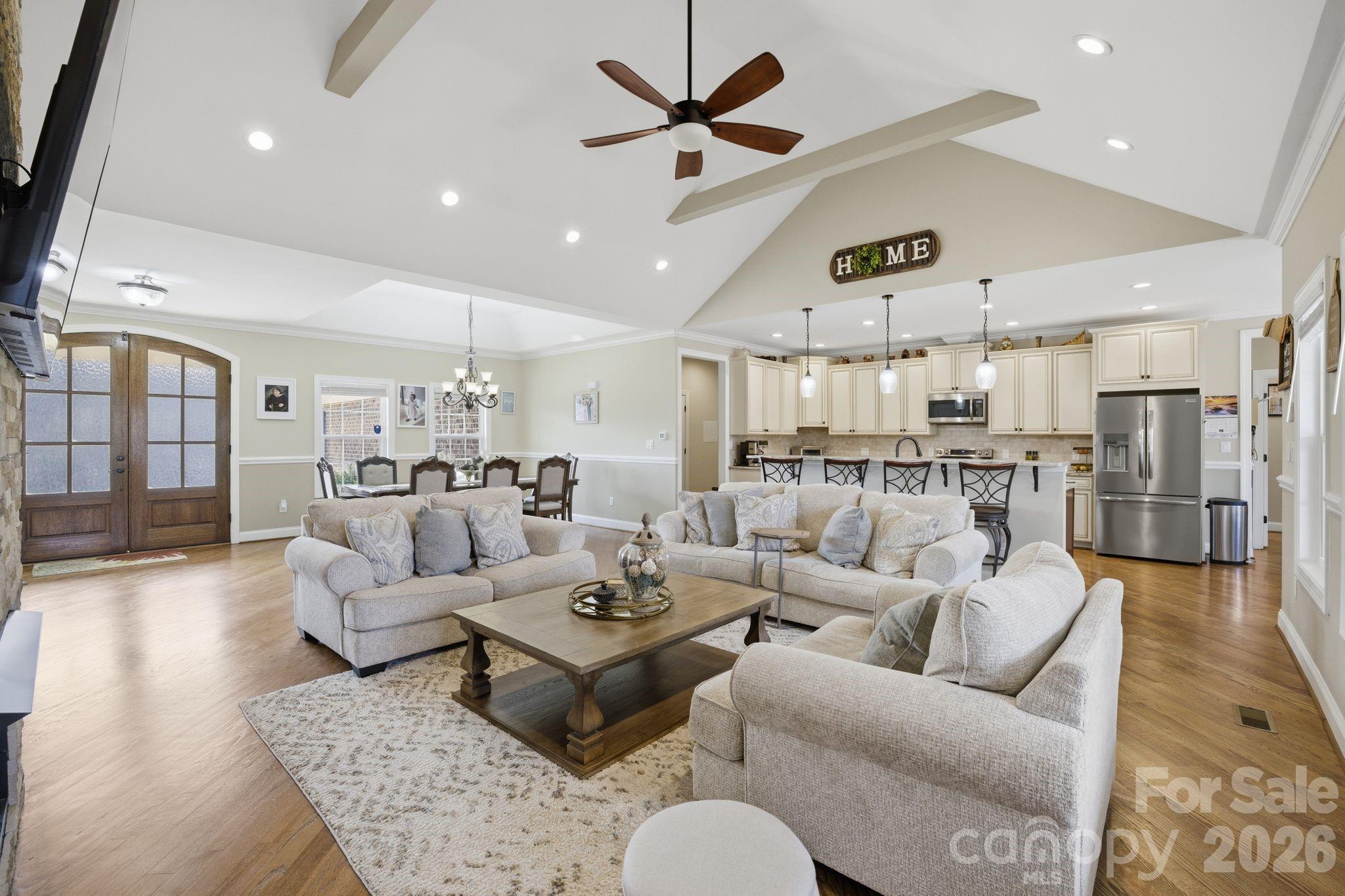 1370 Null Road, Unit 4 Lincolnton, NC 28092 - Photo 6 of 47 a living room with furniture kitchen view and a wooden floor