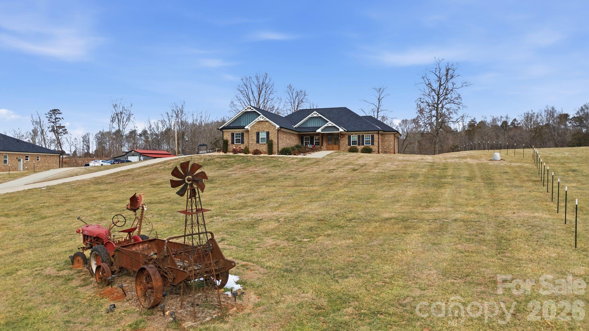 1370 Null Road, Unit 4 Lincolnton, NC 28092 - Photo 9 of 47 a view of a house with a yard