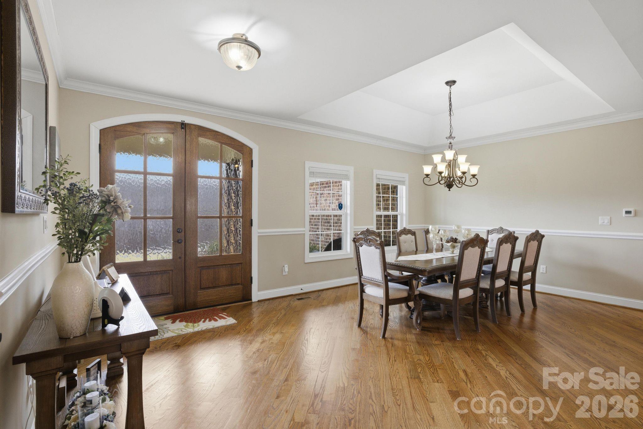 1370 Null Road, Unit 4 Lincolnton, NC 28092 - Photo 10 of 47 a view of a dining room with furniture window and wooden floor