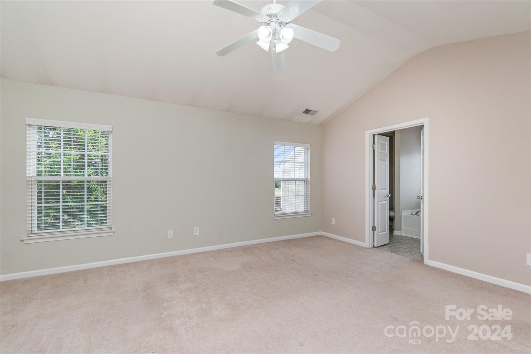 3320 Burnage Hall Road Harrisburg, NC 28075 - Photo 11 of 21 a view of an empty room with a window
