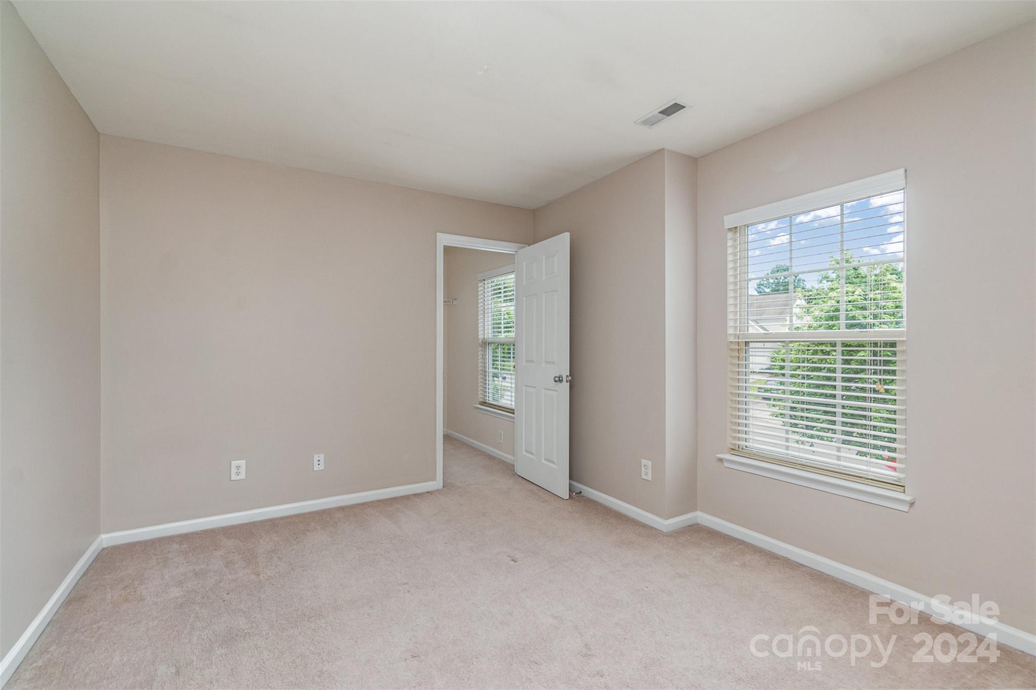 3320 Burnage Hall Road Harrisburg, NC 28075 - Photo 16 of 21 a view of an empty room with a window