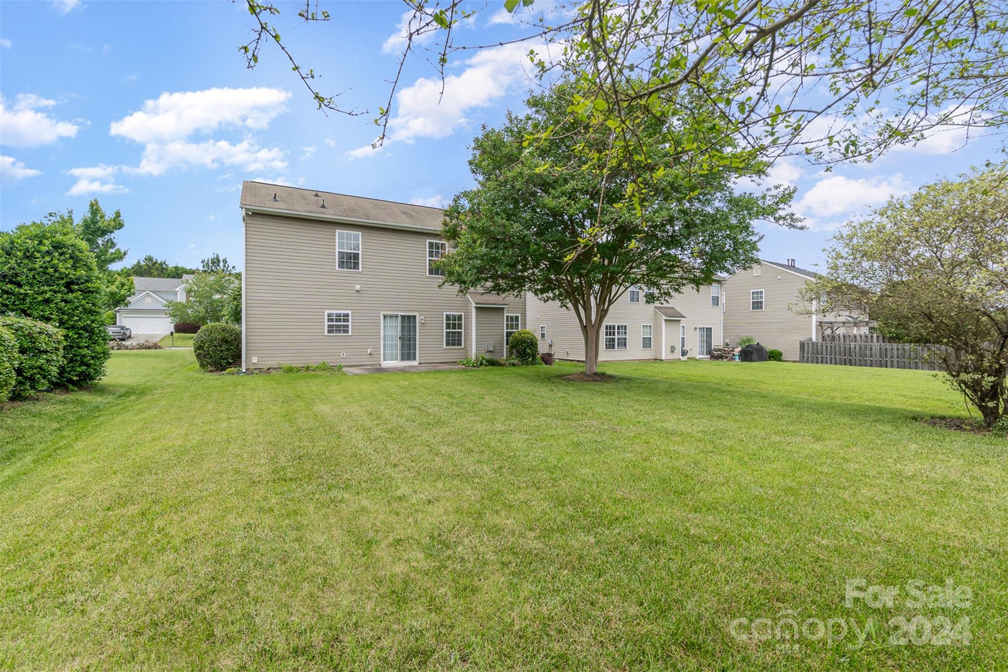 3320 Burnage Hall Road Harrisburg, NC 28075 - Photo 19 of 21 a house view with garden space
