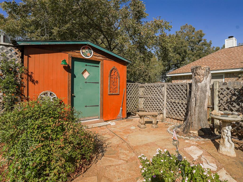 438 South Street Krum, TX 76249 - Photo 19 of 22 View of backyard shed that has electricity...so perfect as a workshop!!