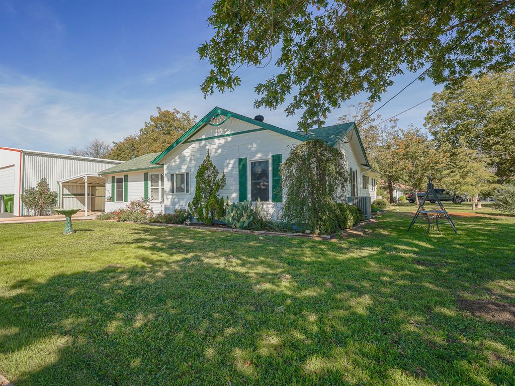 438 South Street Krum, TX 76249 - Photo 2 of 22 View of front of property located on a large corner lot!