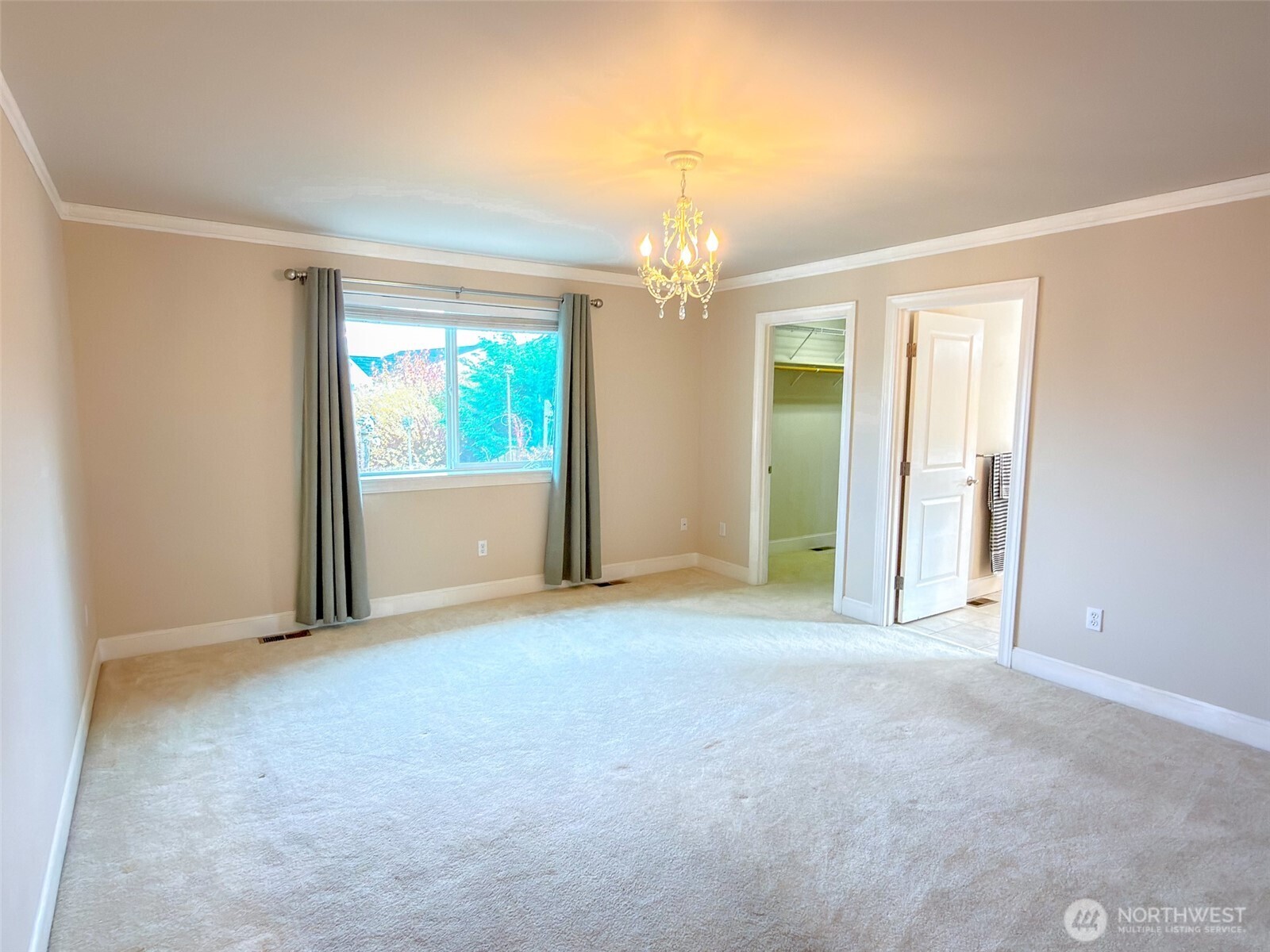 31 Opal Lane Sequim, WA 98382 - Photo 13 of 40 an empty room with windows and door