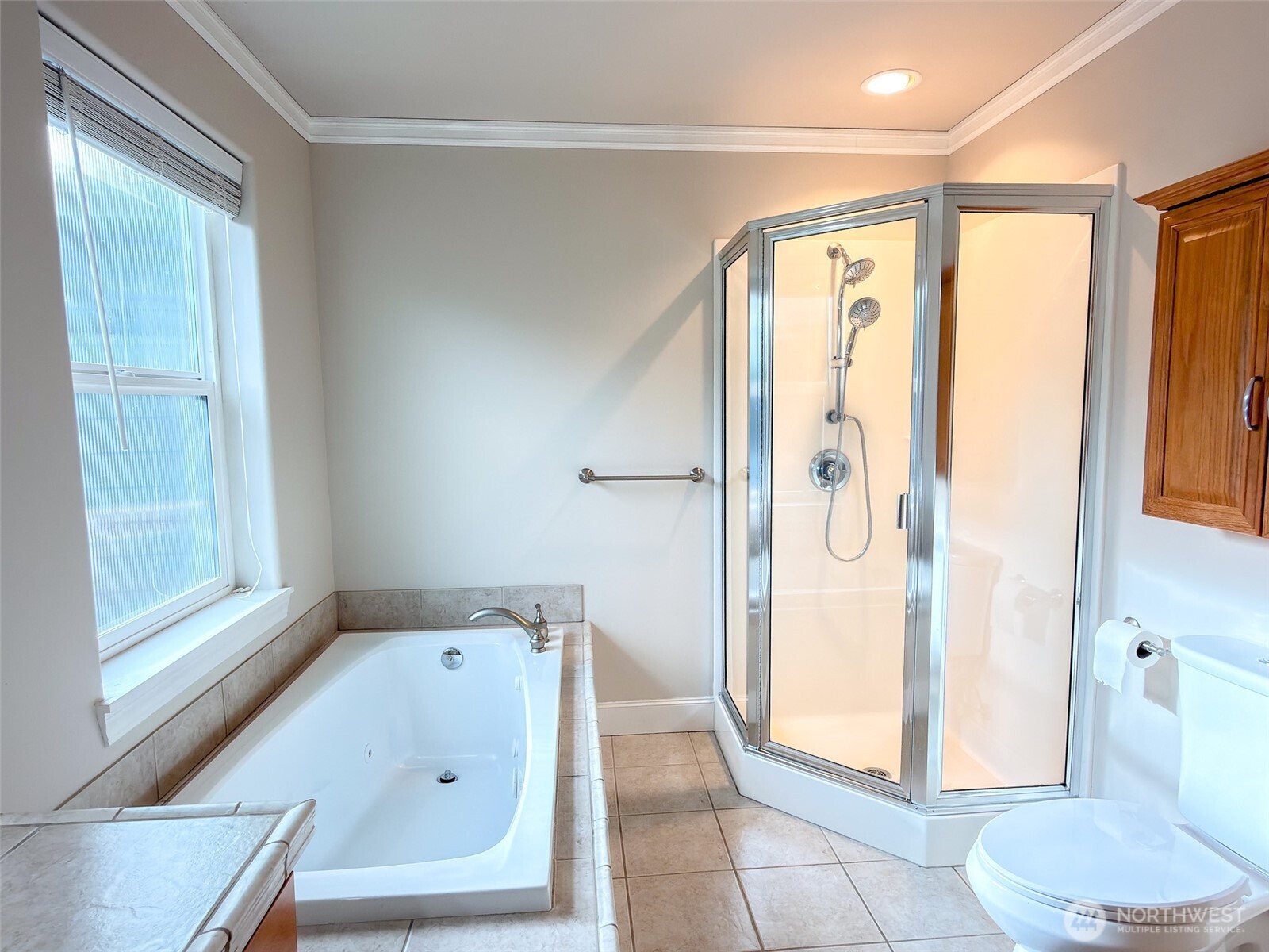 31 Opal Lane Sequim, WA 98382 - Photo 18 of 40 a bathroom with a tub and a shower
