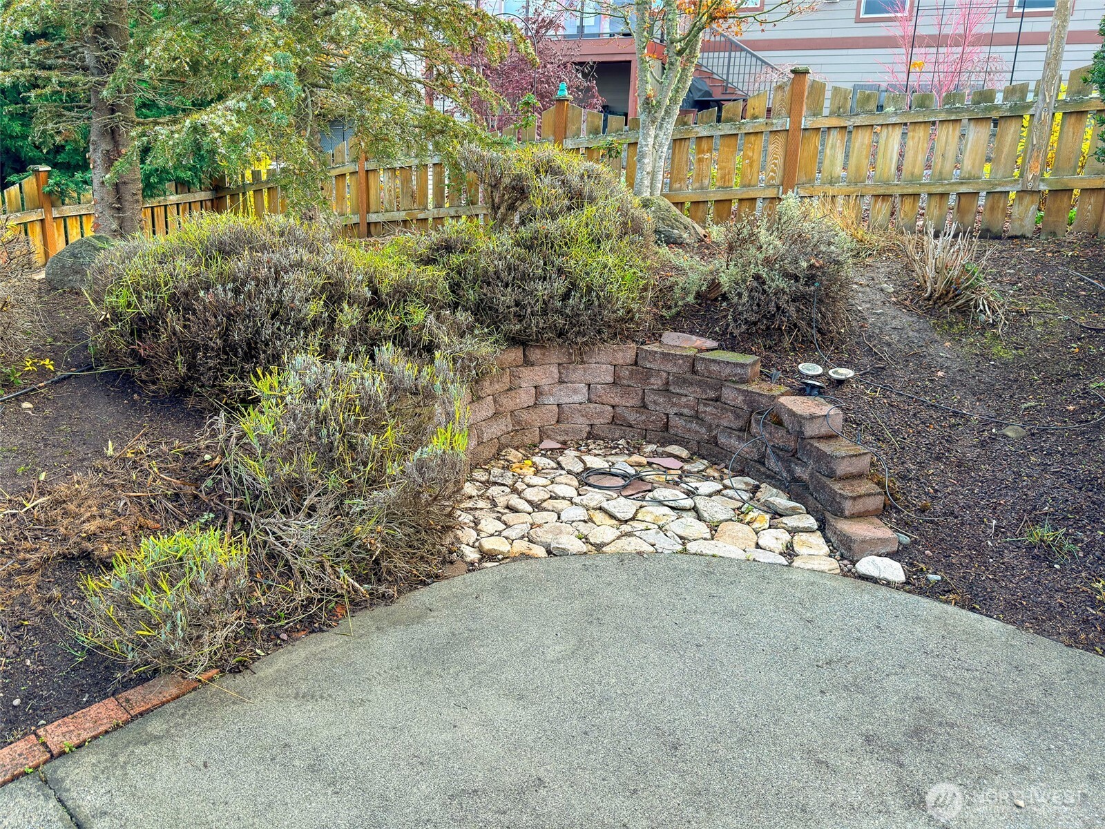 31 Opal Lane Sequim, WA 98382 - Photo 30 of 40 a view of a garden with a bench