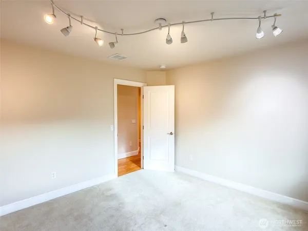 a view of a room with an empty space