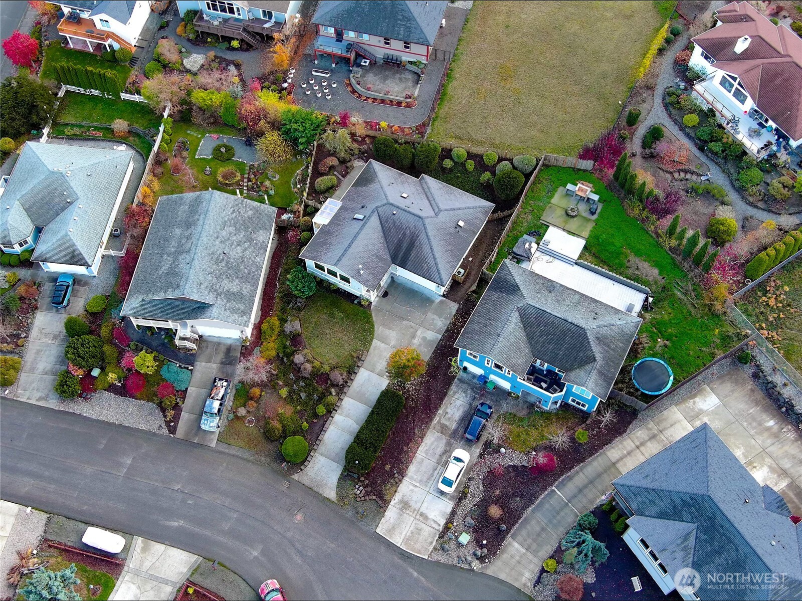 31 Opal Lane Sequim, WA 98382 - Photo 39 of 40 an aerial view of a house with a yard and garden