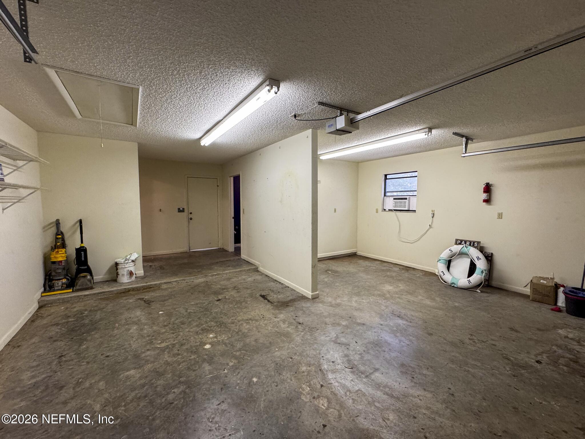 114 Mandarin Lake Road Melrose, FL 32666 - Photo 16 of 26 a view of a livingroom with furniture and a fan