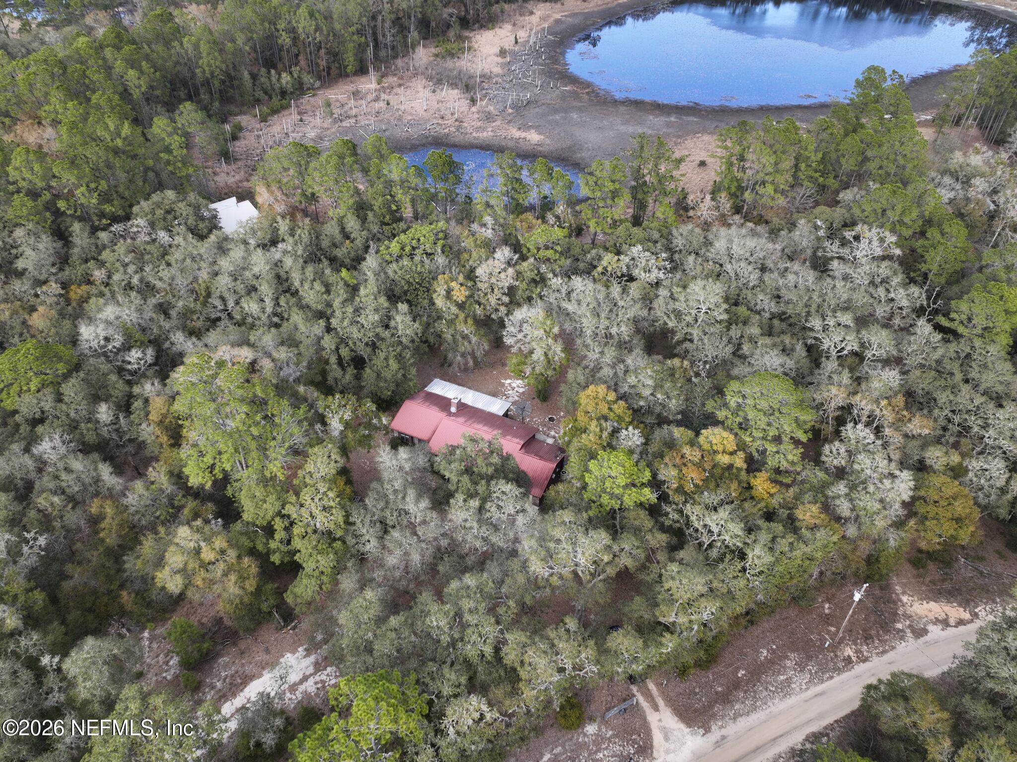 114 Mandarin Lake Road Melrose, FL 32666 - Photo 25 of 26 a view of a backyard