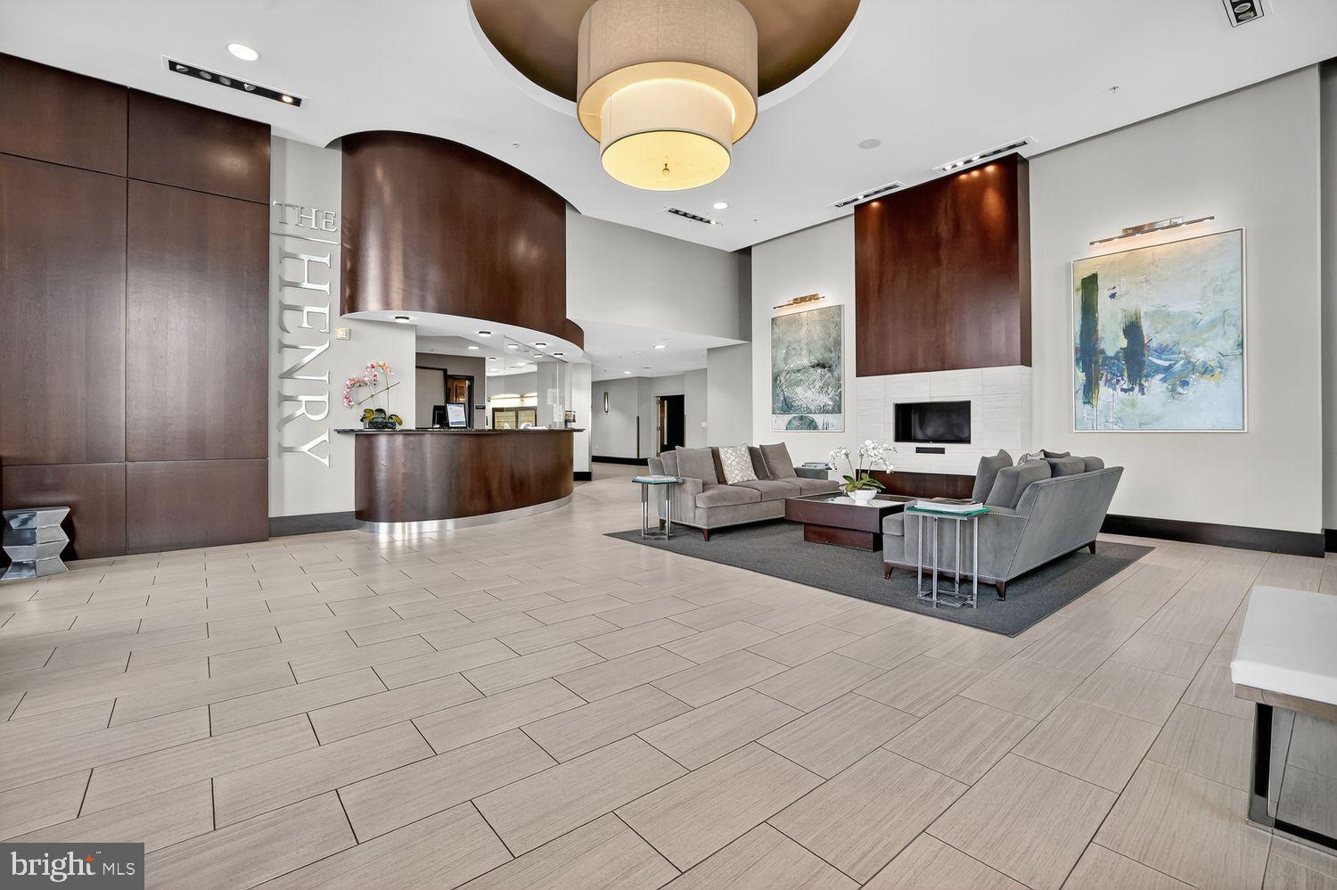 1111 Oronoco Street, Unit 125 Alexandria, VA 22314 - Photo 12 of 20 a living room with furniture and a fireplace