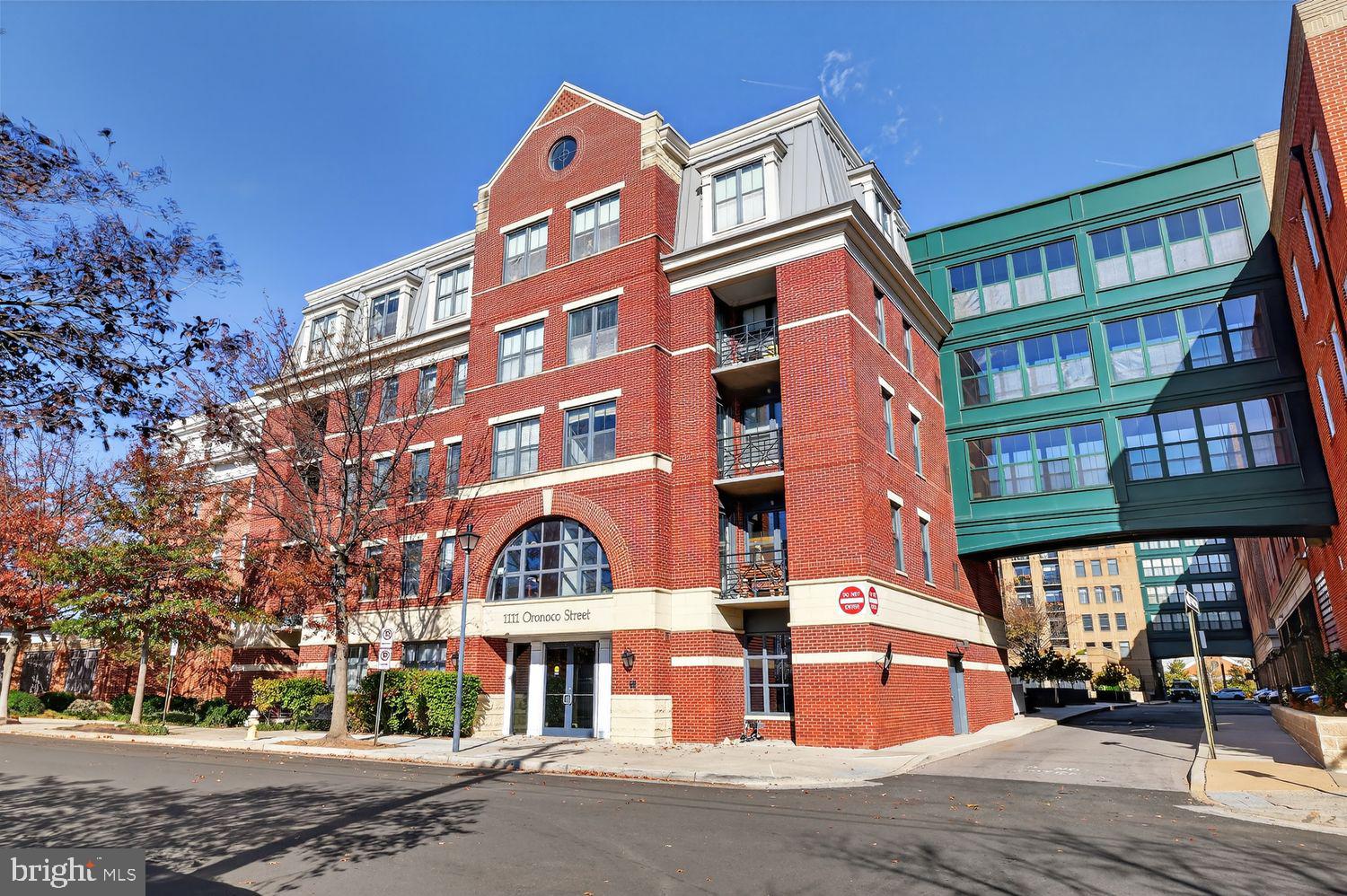 1111 Oronoco Street, Unit 125 Alexandria, VA 22314 - Photo 19 of 20 front view of an buildings with a street