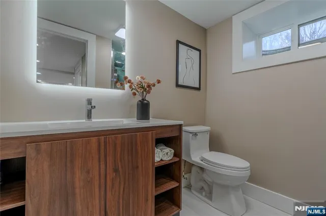 a spacious bedroom with a bed and a table