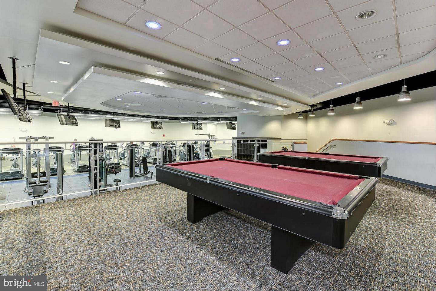 1111 Arlington Boulevard, Unit 815 Arlington, VA 22209 - Photo 16 of 32 a room with lots of furniture and fan