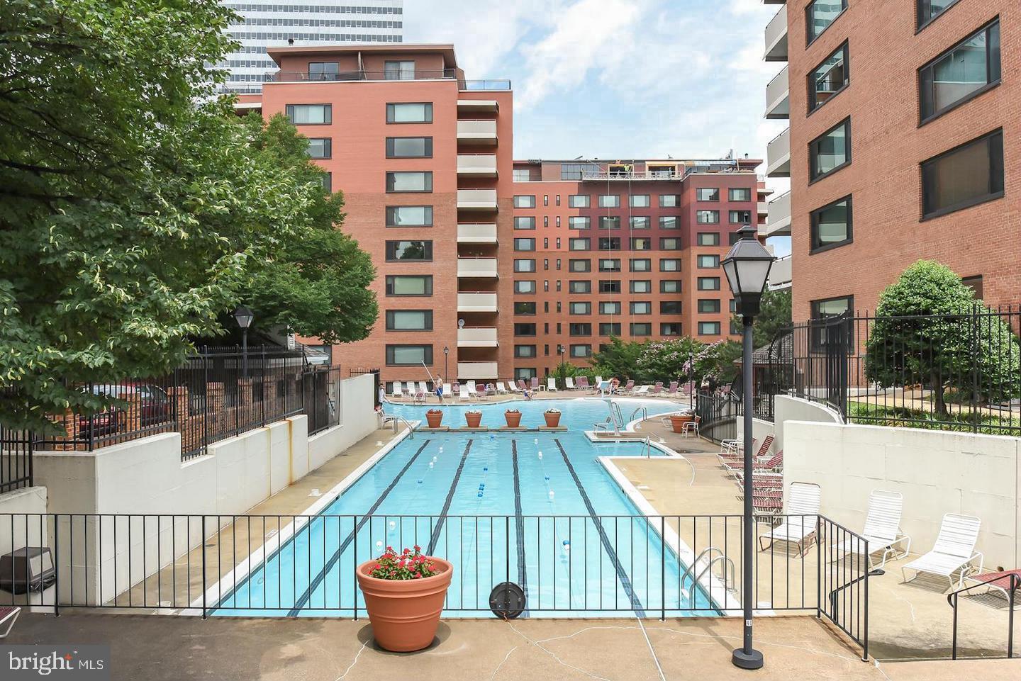 1111 Arlington Boulevard, Unit 815 Arlington, VA 22209 - Photo 18 of 32 a view of a swimming pool with a patio
