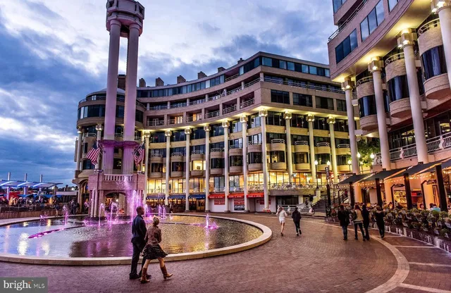 a view of an empty room with windows