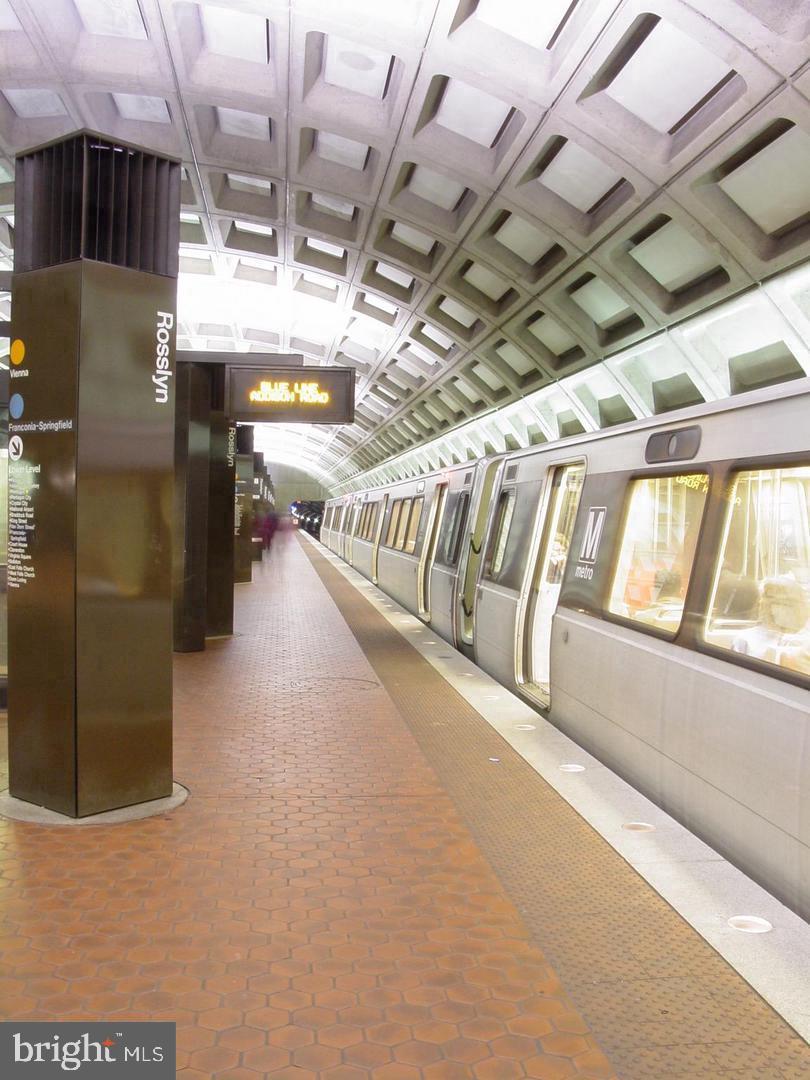 1111 Arlington Boulevard, Unit 815 Arlington, VA 22209 - Photo 30 of 32 a view of an empty room with windows