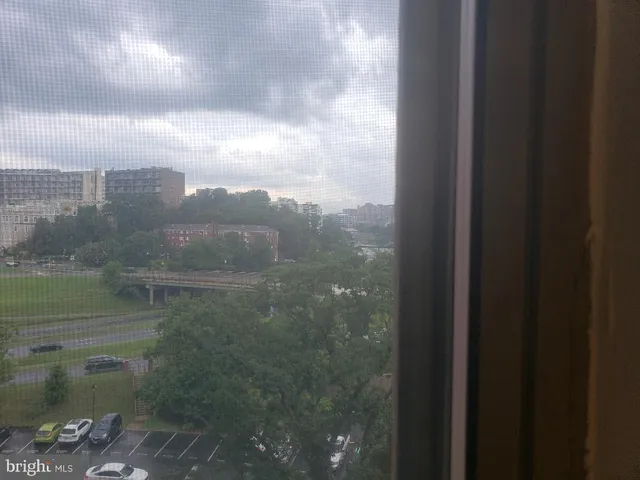 a view of a city with tall buildings