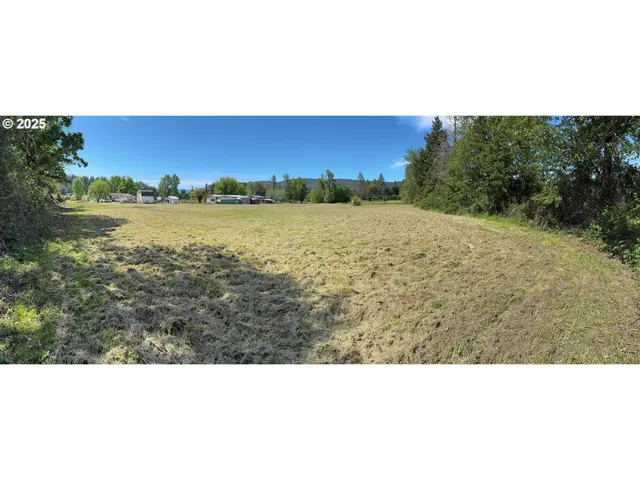 a open area with lake view and mountain view