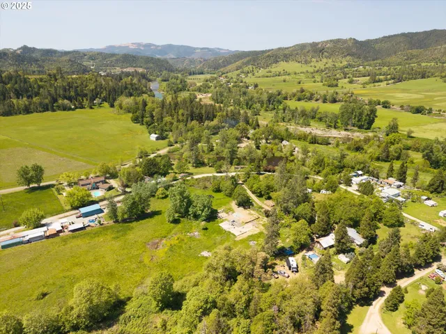 a view of an ocean and a mountain