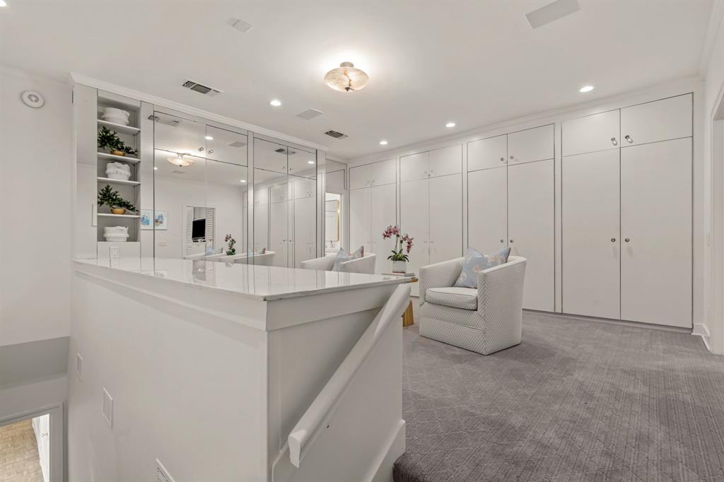 5849 Merrymount Road Westover Hills, TX 76107 - Photo 26 of 40 a bathroom with a double vanity sink and mirror