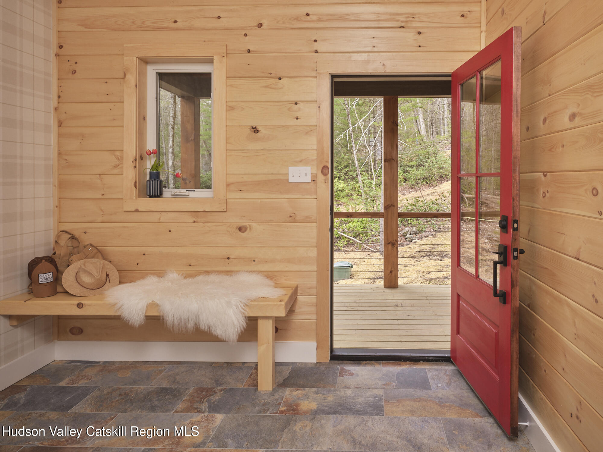30 Dymond Road Kerhonkson, NY 12446 - Photo 19 of 52 a view of a door and chair in the room