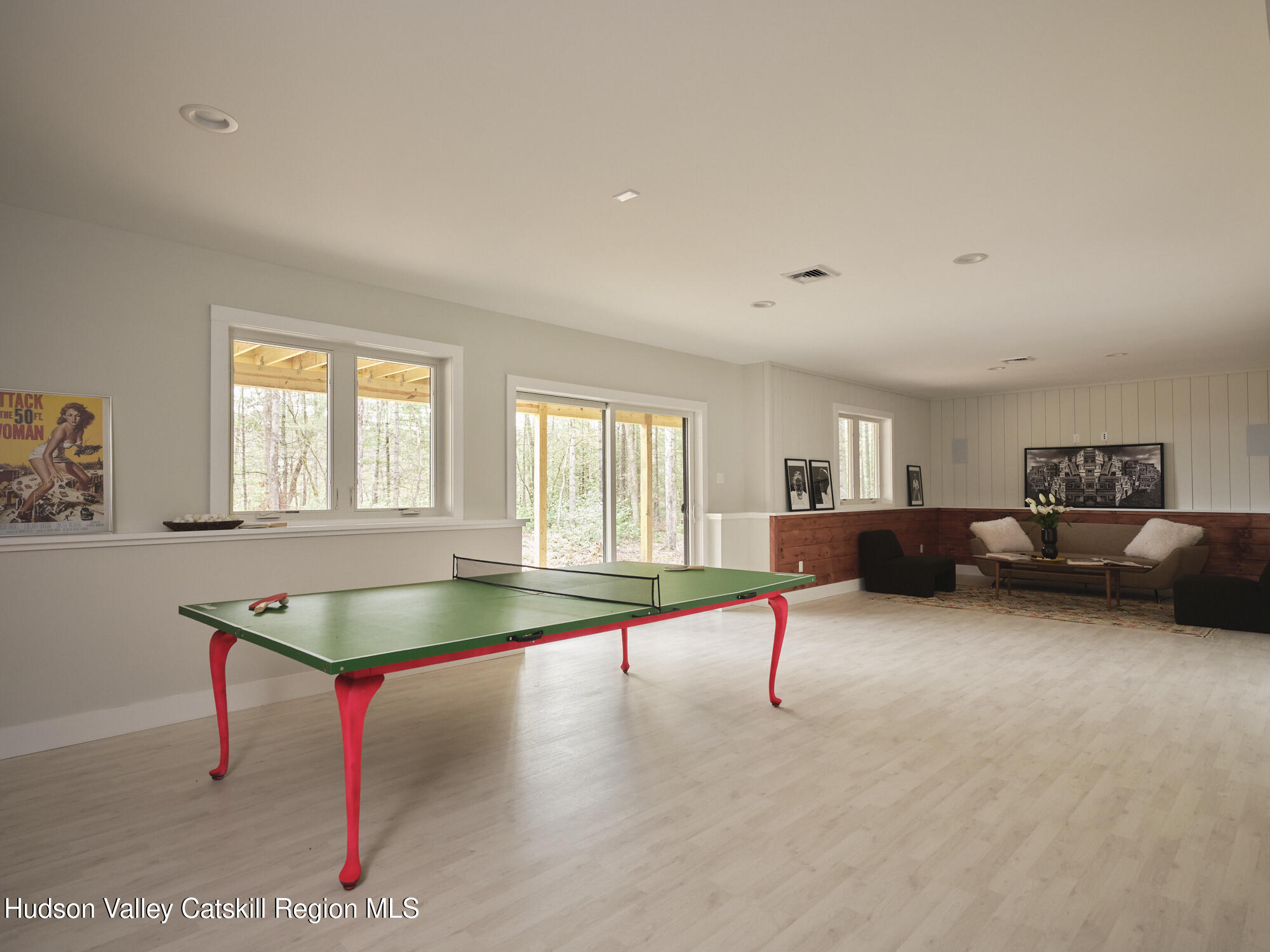 30 Dymond Road Kerhonkson, NY 12446 - Photo 39 of 52 a living room with furniture and a table