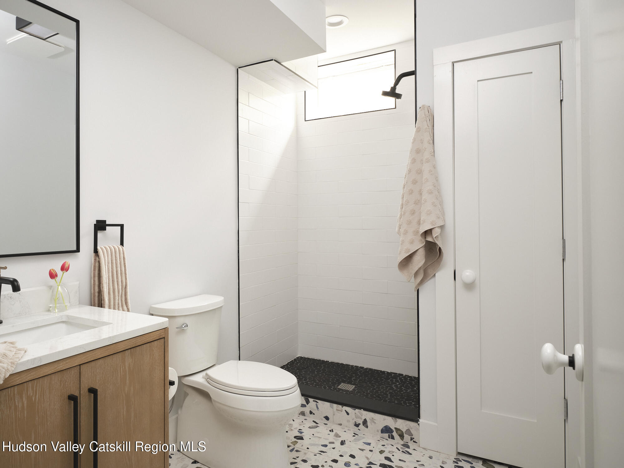 30 Dymond Road Kerhonkson, NY 12446 - Photo 44 of 52 a white toilet sitting next to a bathroom sink