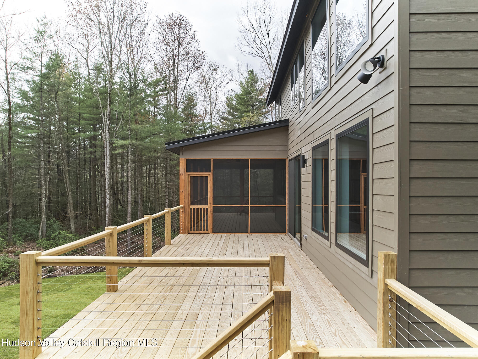 30 Dymond Road Kerhonkson, NY 12446 - Photo 45 of 52 a view of a house with backyard and deck