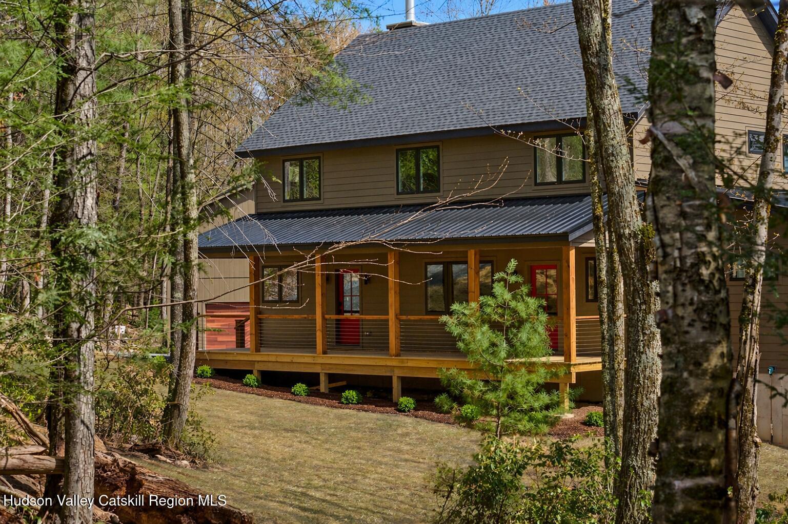 30 Dymond Road Kerhonkson, NY 12446 - Photo 8 of 52 front view of a house with a small yard