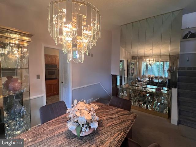 1425 Bucknell Road Wilmington, DE 19803 - Photo 11 of 36 a living room with furniture and a chandelier