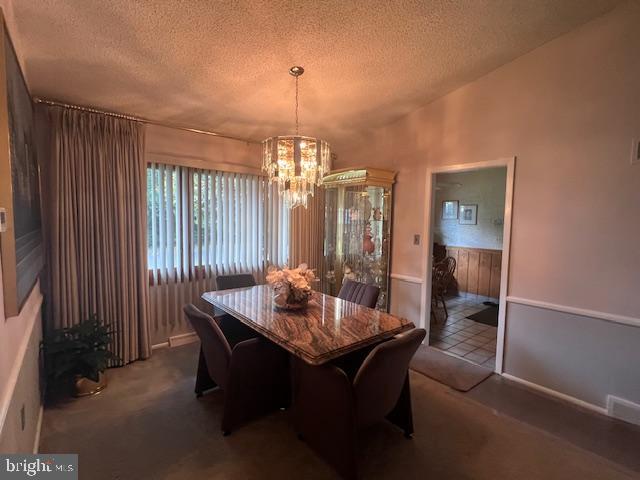 1425 Bucknell Road Wilmington, DE 19803 - Photo 10 of 36 a dining room with furniture and chandelier kitchen view