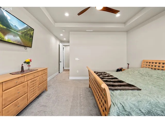 a view of a bathroom with sink and mirror