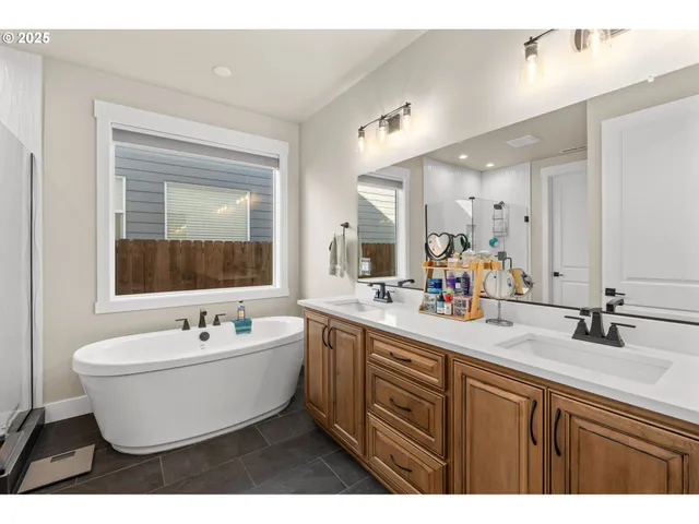 a bathroom with a bathtub and a sink