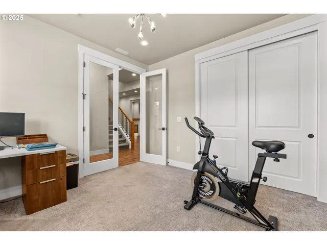 a bathroom with a sink toilet a mirror and shower