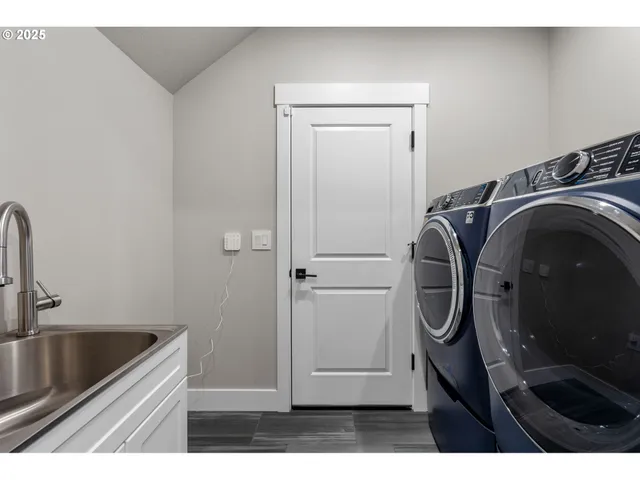a view of a hallway view with wooden floor and staircase