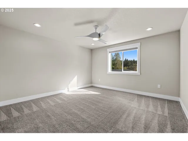 a view of a backyard with a garden and plants