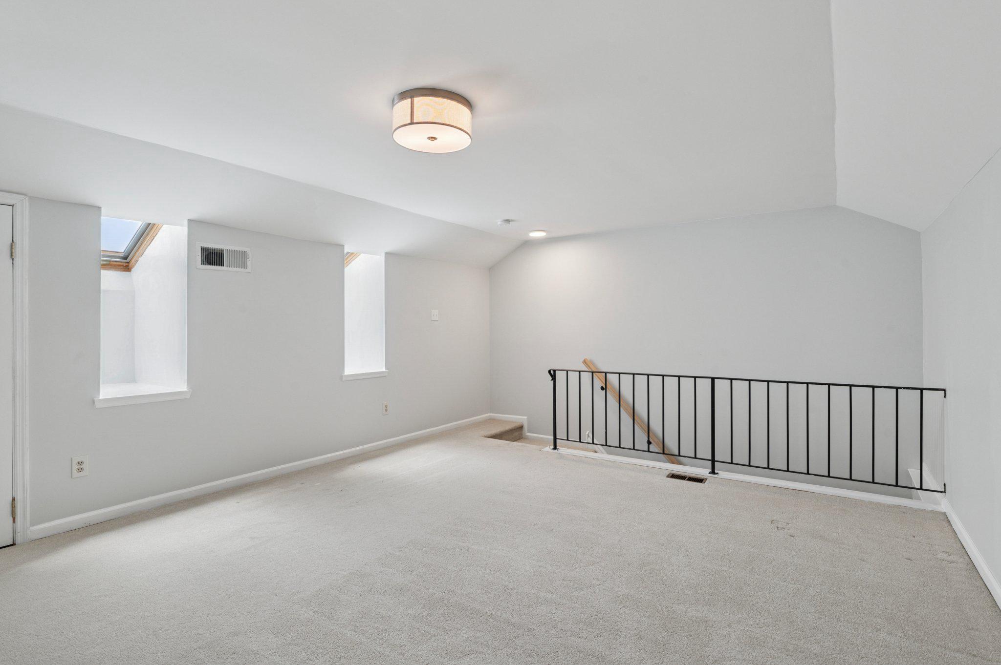 237 McIntosh Road, Unit 82 West Chester, PA 19382 - Photo 17 of 18 a view of an empty room with a window