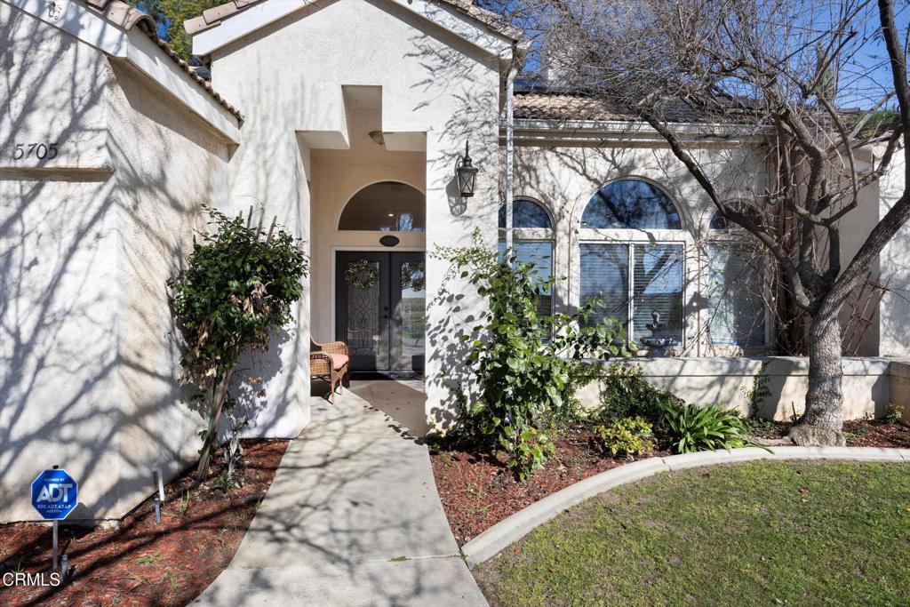 5705 Valley Street Bakersfield, CA 93306 - Photo 12 of 53 a front view of a house with garden
