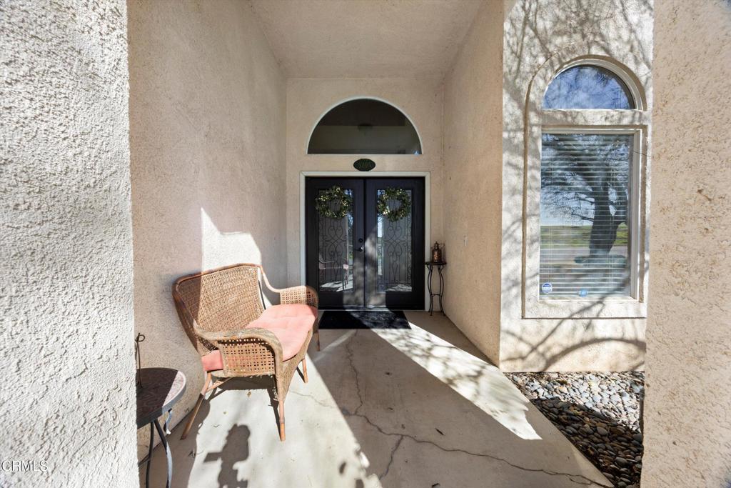 5705 Valley Street Bakersfield, CA 93306 - Photo 13 of 53 a living room with a couch and a fireplace