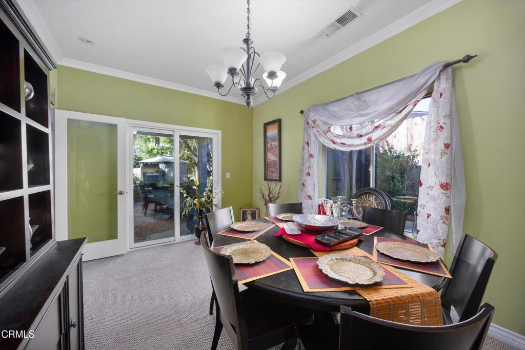5705 Valley Street Bakersfield, CA 93306 - Photo 30 of 53 a view of a dining room with furniture window and outside view