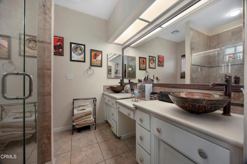 5705 Valley Street Bakersfield, CA 93306 - Photo 34 of 53 a kitchen with a sink and a stove top oven