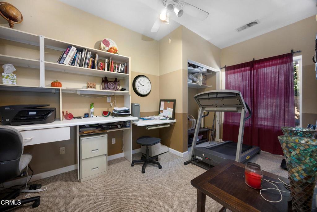 5705 Valley Street Bakersfield, CA 93306 - Photo 41 of 53 a room with furniture a rug and a window
